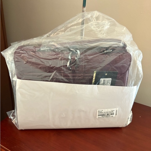 Badgley Mischka Plum and gun metal
Studded Handbag - NWT - Picture 12 of 12